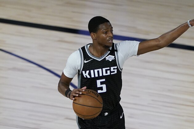Sacramento Kings' De'Aaron Fox (5) looks for a pass during an NBA basketball game against the New Orleans Pelicans Thursday, Aug. 6, 2020, in Lake Buena Vista, Fla. (AP Photo/Ashley Landis, Pool)