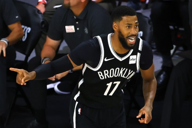 Brooklyn Nets' Garrett Temple celebrates a basket against the Toronto Raptors during the third quarter in Game 2 of an NBA basketball first-round playoff series, Wednesday, Aug. 19, 2020, in Lake Buena Vista, Fla. (Kevin C. Cox/Pool Photo via AP)