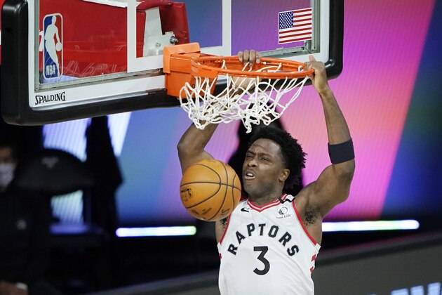 Toronto Raptors' OG Anunoby scores against the Boston Celtics during the second half of an NBA basketball conference semifinal playoff game Sunday, Aug. 30, 2020, in Lake Buena Vista, Fla. (AP Photo/Ashley Landis)