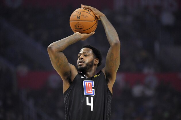 Los Angeles Clippers forward JaMychal Green shoots during the first half of an NBA basketball game against the Golden State Warriors Friday, Jan. 10, 2020, in Los Angeles. (AP Photo/Mark J. Terrill)