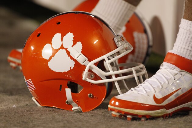 A Clemson football helmet rests on the sidelines against Virginia Tech during the second half of an NCAA college football game in Charlotte, N.C., Saturday, Dec. 3, 2011. Clemson won the ACC Championship game  38-10. (AP Photo/Bob Leverone)
