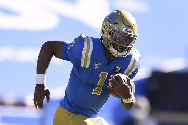 UCLA quarterback Dorian Thompson-Robinson runs the ball during the second half of an NCAA college football game against California in Los Angeles, Sunday, Nov. 15, 2020. UCLA won 34-10. (AP Photo/Kelvin Kuo)