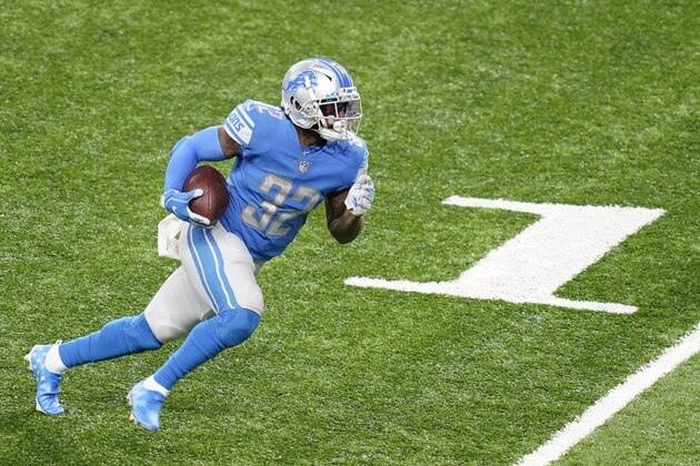 Detroit Lions running back D'Andre Swift runs during the second half of an NFL football game against the Washington Football Team, Sunday, Nov. 15, 2020, in Detroit. (AP Photo/Carlos Osorio)