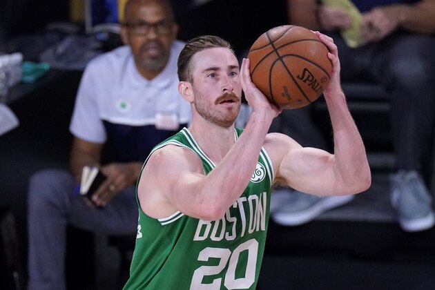 Boston Celtics' Gordon Hayward (20) attempts a shot during the second half of an NBA conference final playoff basketball game against the Miami Heat on Saturday, Sept. 19, 2020, in Lake Buena Vista, Fla. (AP Photo/Mark J. Terrill)