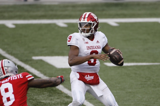 Indiana quarterback Michael Penix looks for an open receive against Ohio State during the first half of an NCAA college football game Saturday, Nov. 21, 2020, in Columbus, Ohio. (AP Photo/Jay LaPrete) Indiana quarterback Michael Penix looks for an open receive against Ohio State during the first half of an NCAA college football game Saturday, Nov. 21, 2020, in Columbus, Ohio. (AP Photo/Jay LaPrete)