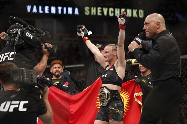 Valentina Shevchenko celebrates after defeating Jessica Eye during their women's flyweight title mixed martial arts bout at UFC 238, Saturday, June 8, 2019, in Chicago. (AP Photo/Kamil Krzaczynski)