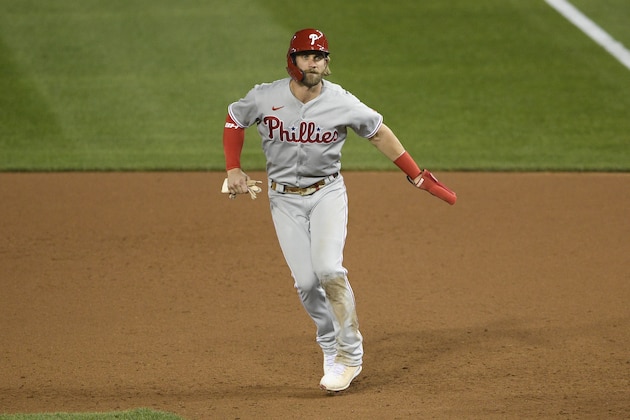 Philadelphia Phillies' Bryce Harper takes a lead during a baseball game against the Washington Nationals, Wednesday, Sept. 23, 2020, in Washington. (AP Photo/Nick Wass)