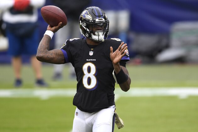 Baltimore Ravens quarterback Lamar Jackson throws a pass against the Tennessee Titans during the first half of an NFL football game, Sunday, Nov. 22, 2020, in Baltimore. (AP Photo/Nick Wass)