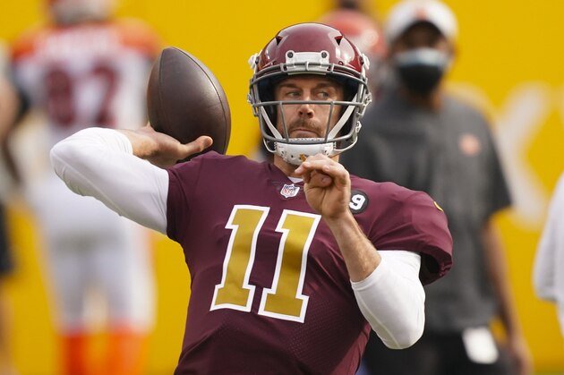Washington Football Team quarterback Alex Smith (11) throws the ball before the start of an NFL football game against the Cincinnati Bengals, Sunday, Nov. 22, 2020, in Landover. (AP Photo/Andrew Harnik)