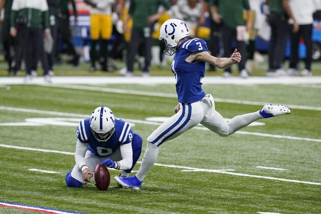 Indianapolis Colts kicker Rodrigo Blankenship (3) kicks a field goal out of the hold of Rigoberto Sanchez (8) during the second half of an NFL football game against the Green Bay Packers, Sunday, Nov. 22, 2020, in Indianapolis. (AP Photo/Michael Conroy)