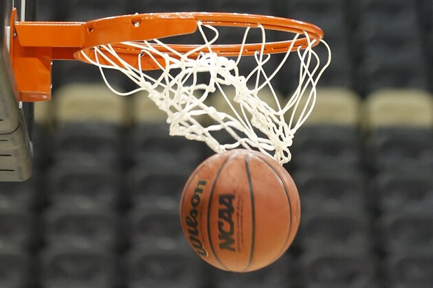 Basketballs head through the hoops in the practice session for Lafayette  for an NCAA college basketball second round game in Pittsburgh Wednesday, March 18, 2015. (AP Photo/Keith Srakocic)