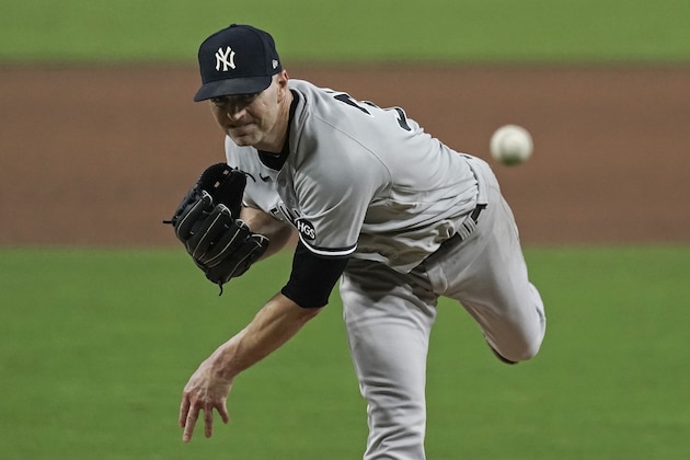 New York Yankees pitcher J.A. Happ throws against the Tampa Bay Rays during the fourth inning in Game 2 of a baseball American League Division Series Tuesday, Oct. 6, 2020, in San Diego. (AP Photo/Jae C. Hong)