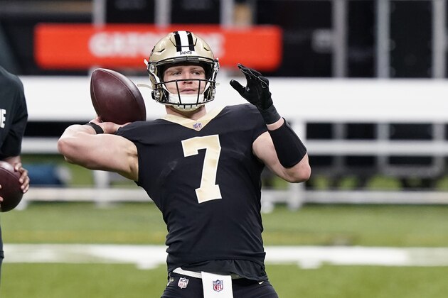 New Orleans Saints quarterback Taysom Hill (7), starting for an injured Drew Brees, warms up before an NFL football game against the Atlanta Falcons in New Orleans, Sunday, Nov. 22, 2020. (AP Photo/Butch Dill)