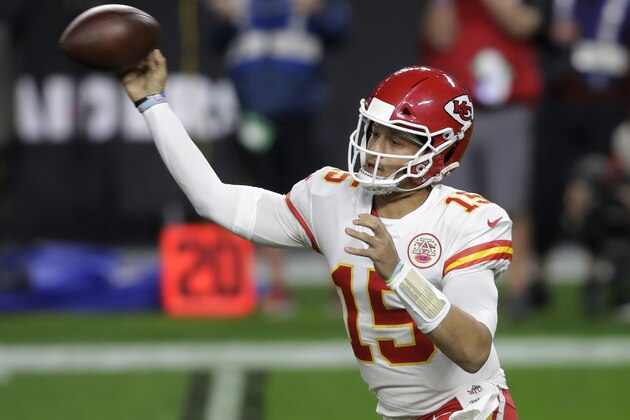 Kansas City Chiefs quarterback Patrick Mahomes (15) throws against the Las Vegas Raiders during the first half of an NFL football game, Sunday, Nov. 22, 2020, in Las Vegas. (AP Photo/Isaac Brekken)