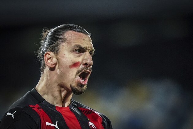 AC Milan's Zlatan Ibrahimovic celebrates scoring during the Serie A soccer match between Napoli and AC Milan, at the San Paolo Stadium in Naples, Italy, Sunday, Nov. 22, 2020. (Alessandro Garofalo/LaPresse via AP)