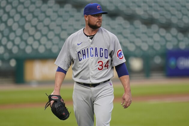 Chicago Cubs pitcher Jon Lester walks to the dugout against the Detroit Tigers in the first inning of a baseball game in Detroit, Wednesday, Aug. 26, 2020. (AP Photo/Paul Sancya)