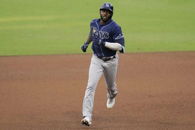Tampa Bay Rays' Randy Arozarena runs around the bases after hitting a home run against the New York Yankees during the fifth inning in Game 3 of a baseball American League Division Series, Wednesday, Oct. 7, 2020, in San Diego. (AP Photo/Gregory Bull)