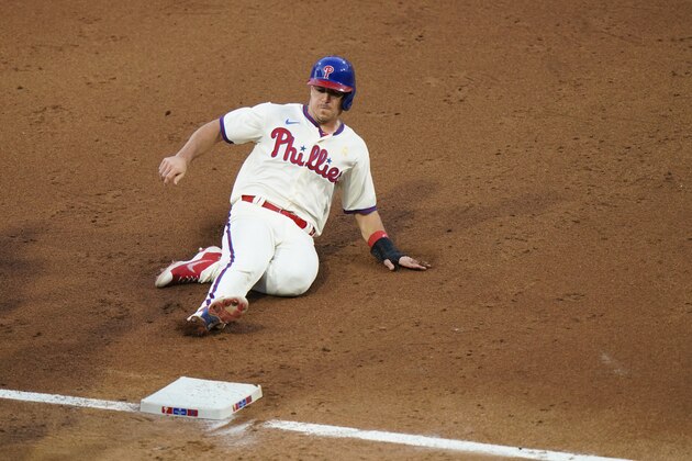 Philadelphia Phillies' J.T. Realmuto plays during first baseball game in a doubleheader against the Boston Red Sox, Tuesday, Sept. 8, 2020, in Philadelphia. (AP Photo/Matt Slocum)