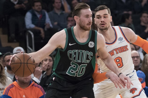 Boston Celtics forward Gordon Hayward (20) drives against New York Knicks forward Mario Hezonja (8) during the second half of an NBA basketball game Friday, Feb. 1, 2019, at Madison Square Garden in New York. The Celtics won 113-99. (AP Photo/Mary Altaffer)