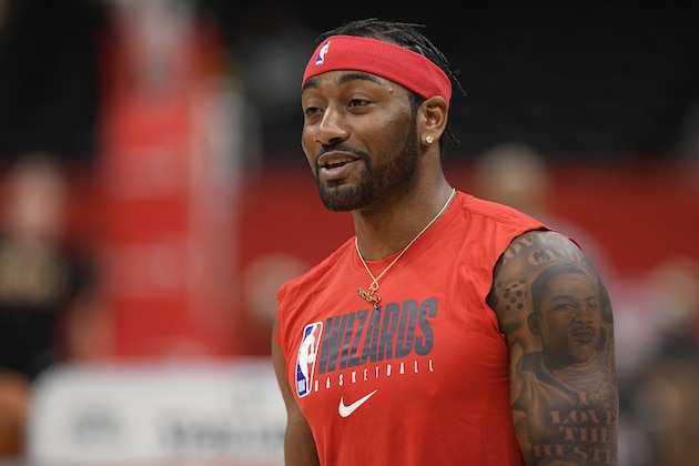 Washington Wizards guard John Wall works out prior to an NBA basketball game against the Milwaukee Bucks, Monday, Feb. 24, 2020, in Washington. (AP Photo/Nick Wass)