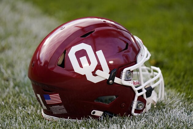 An Oklahoma helmet sits on the field before an NCAA college football game between Iowa State and Oklahoma, Saturday, Oct. 3, 2020, in Ames, Iowa. (AP Photo/Charlie Neibergall)
