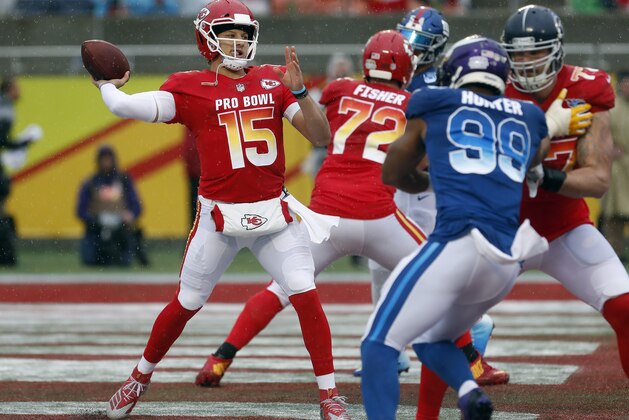 AFC quarterback Patrick Mahomes (15), of the Kansas City Chiefs, throws a pass against the NFC during the first half of the NFL Pro Bowl football game Sunday, Jan. 27, 2019, in Orlando, Fla. (AP Photo/Mark LoMoglio)