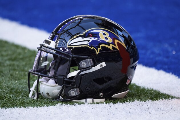 A Baltimore Ravens helmet sits on the field before an NFL football game between the Indianapolis Colts and Baltimore Ravens, Sunday, Nov. 8, 2020, in Indianapolis. (AP Photo/Zach Bolinger)