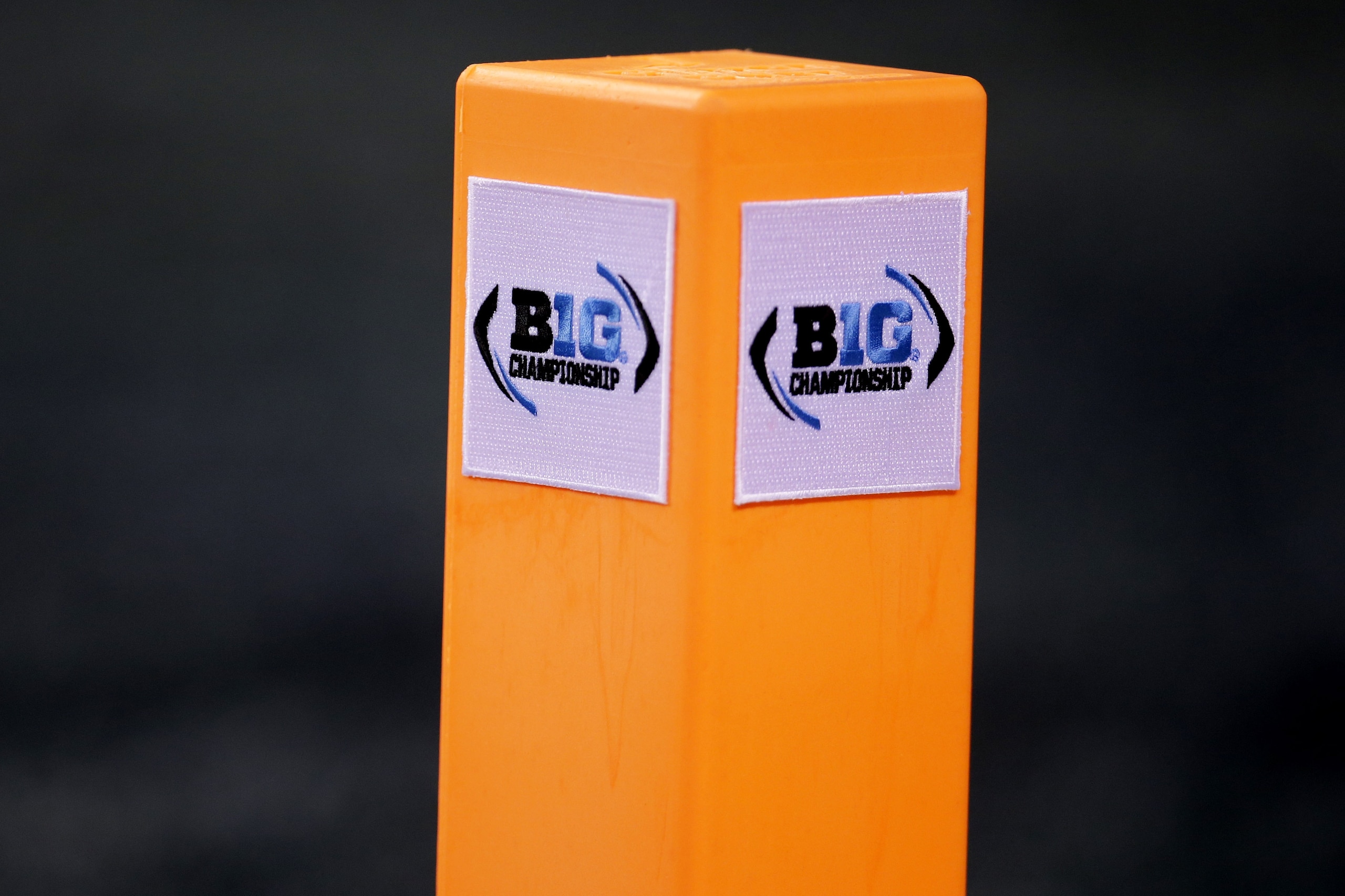The Big 10 Championship logo is shown on a goal line pylon during the first half of the Big Ten Conference championship NCAA college football game between Michigan State and Ohio State Saturday, Dec. 7, 2013, in Indianapolis. (AP Photo/AJ Mast)