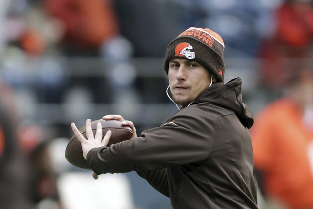 FILE - In this Dec. 20, 2015, file photo, Cleveland Browns quarterback Johnny Manziel warms-up before an NFL football game against the Seattle Seahawks, in Seattle. Former Heisman Trophy-winning quarterback Johnny Manziel says he's making a football comeback. Manziel announced Wednesday, Feb. 14, 2018,  that he will participate in the developmental Spring League in Austin, Texas, which will play from March 28 to April 15. The league is designed for players hoping to impress NFL scouts. The league confirmed Manziel will participate.  (AP Photo/Scott Eklund, File)