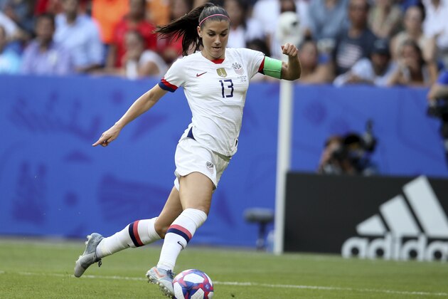 FILE - In this July 7, 2019, file photo, United States' Alex Morgan controls the ball during the Women's World Cup final soccer match against The Netherlands at the Stade de Lyon in Decines, outside Lyon, France. Tottenham secured the biggest signing yet in a summer of high-profile acquisitions in the Womenâ€™s Super League by bringing in United States striker Alex Morgan on a one-season deal. The 31-year-old Morgan will play in England for the first time and moves four months after giving birth to her first child. (AP Photo/David Vincent, File)