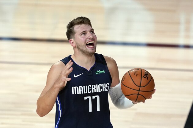 Dallas Mavericks' Luka Doncic (77) reacts after being called for a foul against the Los Angeles Clippers during the first half of an NBA basketball first round playoff game Sunday, Aug. 23, 2020, in Lake Buena Vista, Fla. (AP Photo/Ashley Landis, Pool)