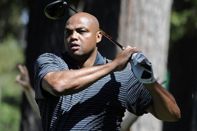 Charles Barkley tees off on the eighth hole during the 20th annual Lake Tahoe Celebrity Golf Championship at Edgewood Tahoe Golf Club in Stateline, Nev., Thursday, July 16, 2009. The celebrity golf championship is celebrating its 20th anniversary. (AP Photo/Reno Gazette-Journal, David B. Parker) ** NEVADA APPEAL OUT. **