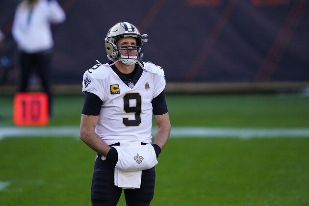 New Orleans Saints quarterback Drew Brees (9) warms up before an NFL football game against the Chicago Bears in Chicago, Sunday, Nov. 1, 2020. (AP Photo/Charles Rex Arbogast)