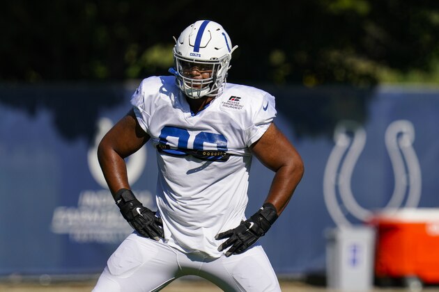 Indianapolis Colts defensive tackle Grover Stewart (90) runs a drill during practice at the NFL team's football training camp in Indianapolis, Wednesday, Aug. 19, 2020. (AP Photo/Michael Conroy)
