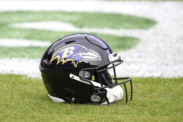 A Baltimore Ravens helmet is seen on the field prior to an NFL football game against the Tennessee Titans, Sunday, Nov. 22, 2020, in Baltimore. (AP Photo/Nick Wass)