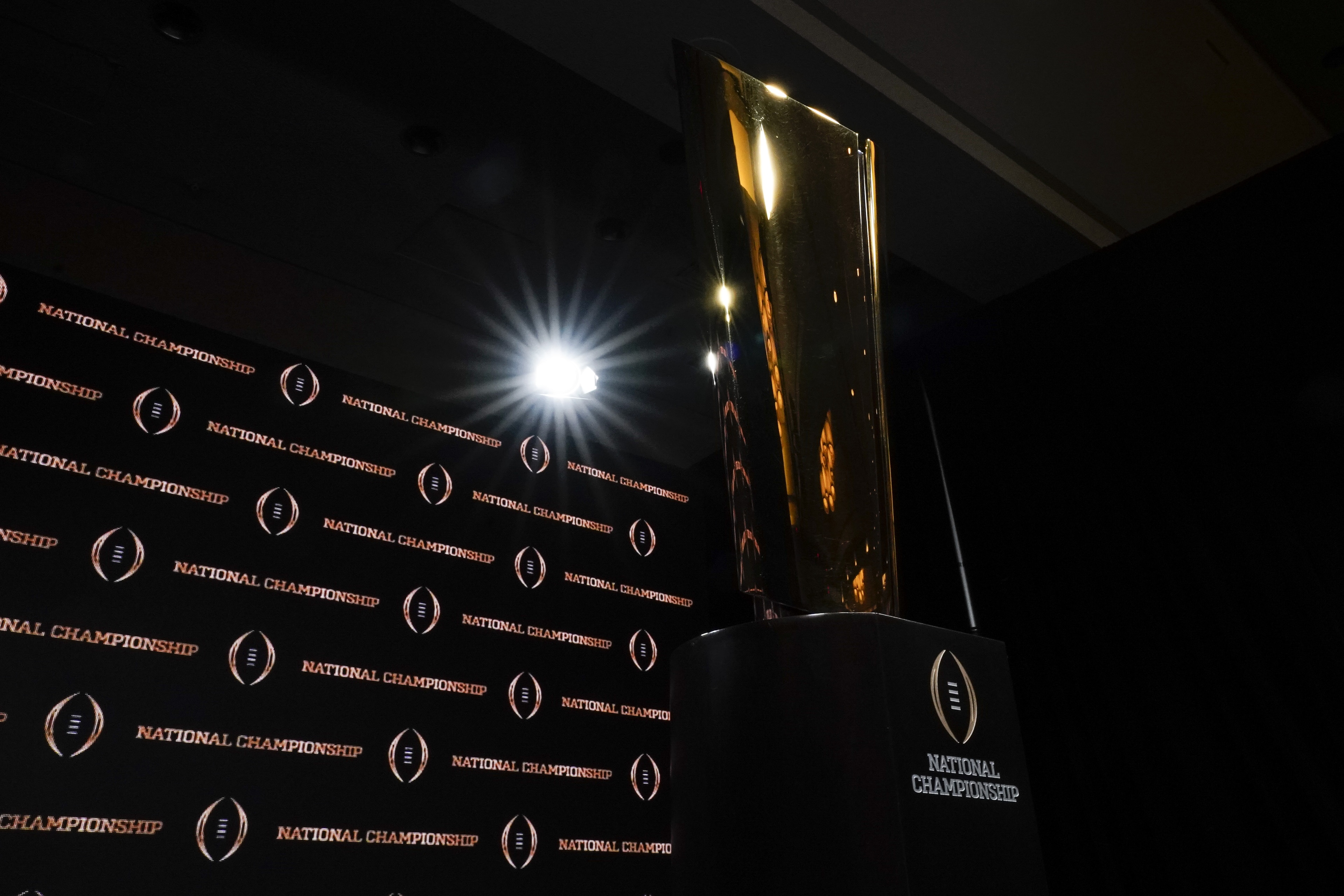 The trophy is displayed before a news conference for the NCAA College Football Playoff national championship game Sunday, Jan. 12, 2020, in New Orleans. Clemson is scheduled to play LSU on Monday. (AP Photo/David J. Phillip). The trophy is displayed before a news conference for the NCAA College Football Playoff national championship game Sunday, Jan. 12, 2020, in New Orleans. Clemson is scheduled to play LSU on Monday. (AP Photo/David J. Phillip).