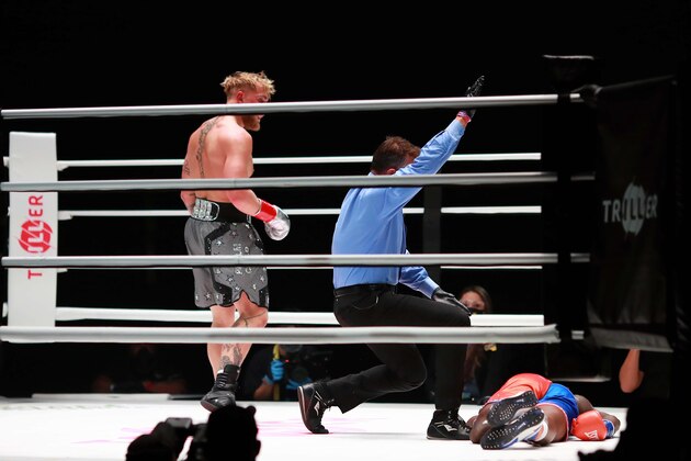 Jake Paul (left) after knocking out Nate Robinson