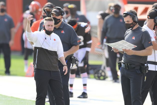 File-This Sept. 27, 2020, file photo shows Cleveland Browns chief of staff Callie Brownson, left, reacting on the sideline during an NFL football game against the Washington Football Team, in Cleveland.  Brownson will handle game-day duties with Cleveland's tight ends on Sunday, Nov. 29, 2020, in Jacksonville, Fla., a first for a female in team history. Brownson, who was hired by Browns coach Kevin Stefanski shortly after he came to Cleveland this year, will fill in for coach Drew Petzing. He did not travel to Florida for the game after his wife, Louisa, gave birth to the coupleâ€™s first child on Saturday. (AP Photo/David Richard, File)