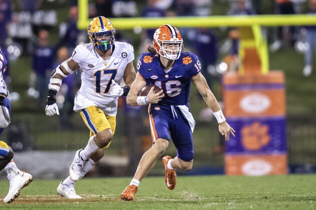 Clemson quarterback Trevor Lawrence (16) runs the ball during the third quarter of an NCAA college football game against Pittsburgh in Clemson, S.C., Saturday, Nov. 28, 2020. (Ken Ruinard/The Independent-Mail via AP, Pool)c