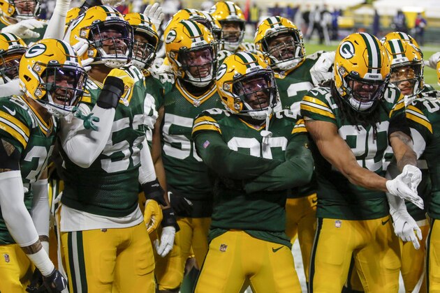 Green Bay Packers' Darnell Savage (26) celebrates his interception with teammates during the first half of an NFL football game Sunday, Nov. 29, 2020, in Green Bay, Wis. (AP Photo/Matt Ludtke)