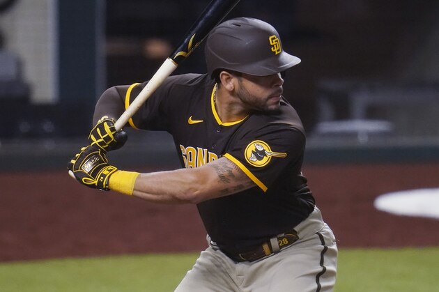 San Diego Padres' Tommy Pham bats in Game 2 of a baseball National League Division Series against the Los Angeles Dodgers Wednesday, Oct. 7, 2020, in Arlington, Texas. (AP Photo/Sue Ogrocki)