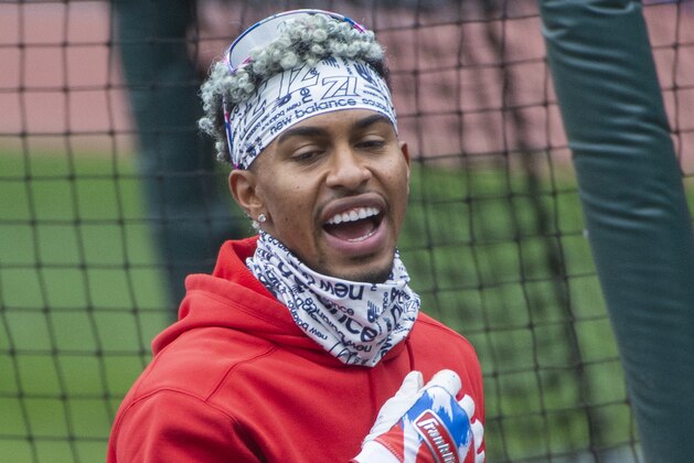 Cleveland Indians' Francisco Lindor talks to his teammates before Game 2 of an American League wild-card baseball series against the New York Yankees in Cleveland, Wednesday, Sept. 30, 2020. (AP Photo/Phil Long)