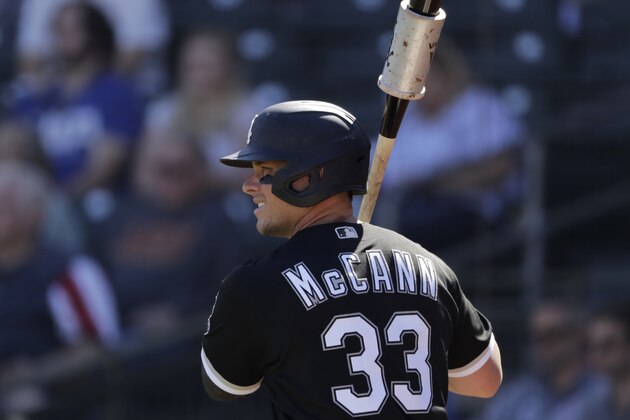 Chicago White Sox's James McCann bats during the second inning of a spring training baseball game against the Texas Rangers Saturday, Feb. 29, 2020, in Surprise, Ariz. (AP Photo/Charlie Riedel)