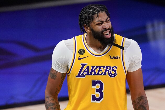 Los Angeles Lakers forward Anthony Davis plays against the Miami Heat during the second half in Game 4 of basketball's NBA Finals Tuesday, Oct. 6, 2020, in Lake Buena Vista, Fla. (AP Photo/Mark J. Terrill)