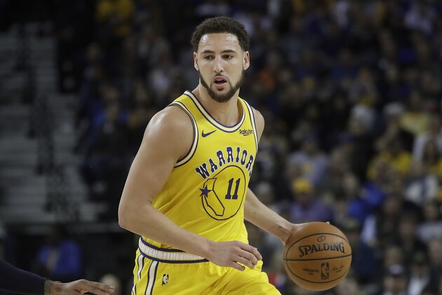 Golden State Warriors guard Klay Thompson (11) against the Denver Nuggets during an NBA basketball game in Oakland, Calif., Tuesday, April 2, 2019. (AP Photo/Jeff Chiu)
