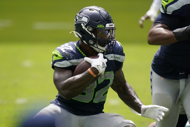 Seattle Seahawks running back Chris Carson (32) runs the ball during the first half of an NFL football game against the Miami Dolphins, Sunday, Oct. 4, 2020 in Miami Gardens, Fla. (AP Photo/Wilfredo Lee) Seattle Seahawks running back Chris Carson (32) runs the ball during the first half of an NFL football game against the Miami Dolphins, Sunday, Oct. 4, 2020 in Miami Gardens, Fla. (AP Photo/Wilfredo Lee)