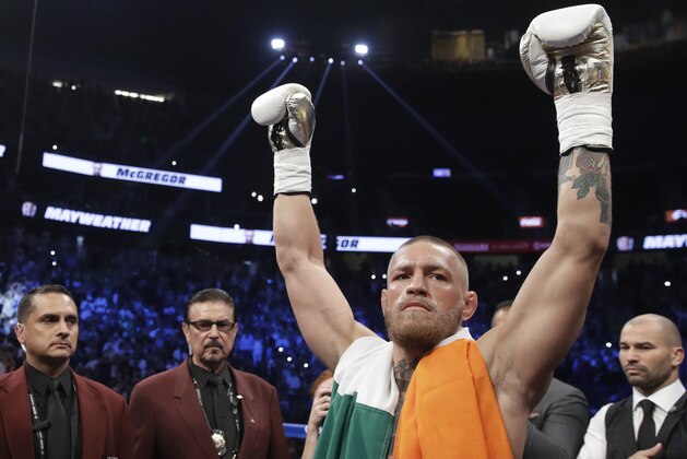 Conor McGregor reacts before a super welterweight boxing match against Floyd Mayweather Jr., Saturday, Aug. 26, 2017, in Las Vegas. (AP Photo/Isaac Brekken)