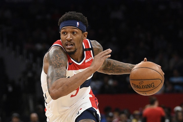 FILE - In this March 8, 2020, file photo, Washington Wizards guard Bradley Beal drives during an NBA basketball game against the Miami Heat in Washington. The Wizards wonâ€™t have Beal, John Wall or Davis Bertans when the NBA returns amid the coronavirus pandemic. When the league stopped play in March because of the COVID-19 outbreak, the Wizards were 24-40 and ninth in the Eastern Conference.  (AP Photo/Nick Wass, File)