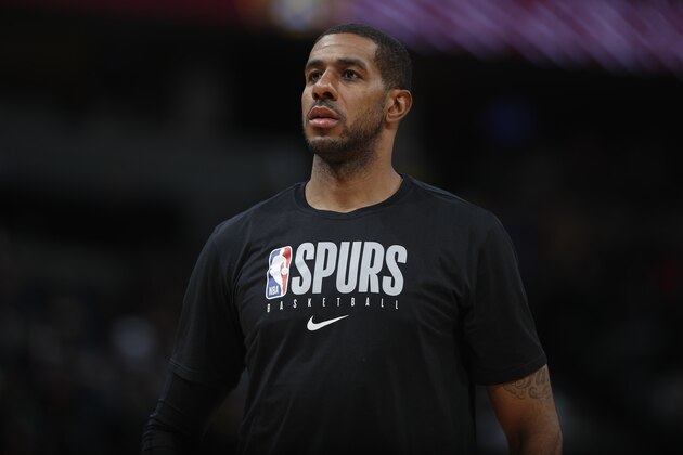 San Antonio Spurs forward LaMarcus Aldridge (12) in the second half of an NBA basketball game Monday, Feb.10, 2020, in Denver. The Nuggets won 127-120. (AP Photo/David Zalubowski)