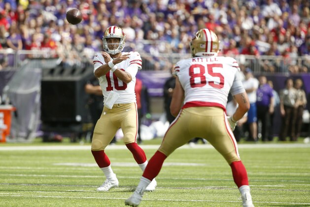 San Francisco 49ers quarterback Jimmy Garoppolo (10) passes to tight end George Kittle (85) during the first half of an NFL football game against the Minnesota Vikings, Sunday, Sept. 9, 2018, in Minneapolis. (AP Photo/Bruce Kluckhohn)